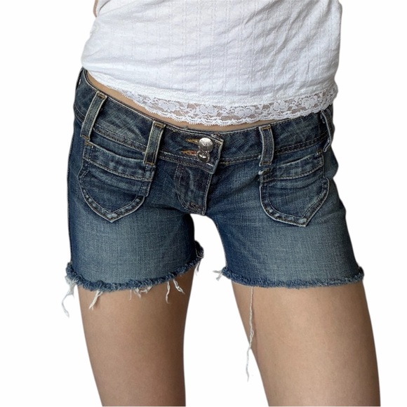 People's Liberation Pants - People’s liberation low rise cut off denim shorts with star pockets